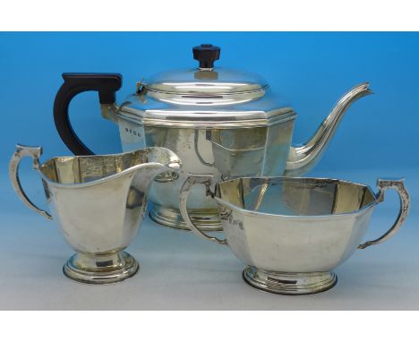 A three piece silver tea service, Birmingham 1934, W.N Ltd., 975g