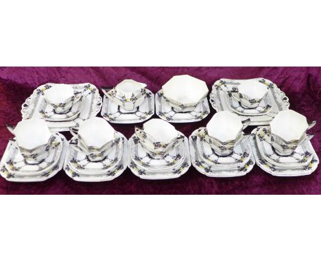 A Shelley twelve setting Queen Anne Sunrise with Tall Trees pattern tea service, forty pieces in total, two cups a/f