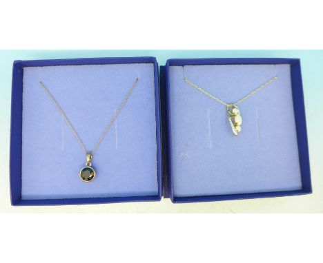 Two 9ct gold pendants and chains, one set with garnet and one set with diamond and synthetic opal, 3.2g