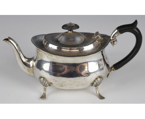 Edward VII hallmarked silver teapot, of plain oval form, raised on four feet, Sheffield 1902, maker&nbsp;William Hutton &amp;