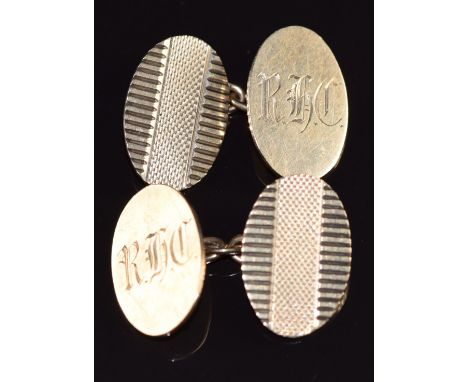 A pair of 9ct gold cufflinks with engine turned decoration and engraved initials, 7g