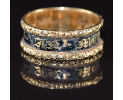 Georgian 18ct gold ring set with black enamel reading 'In memory of' engraved to the inner band 'Edward Gillow born 27th Janu