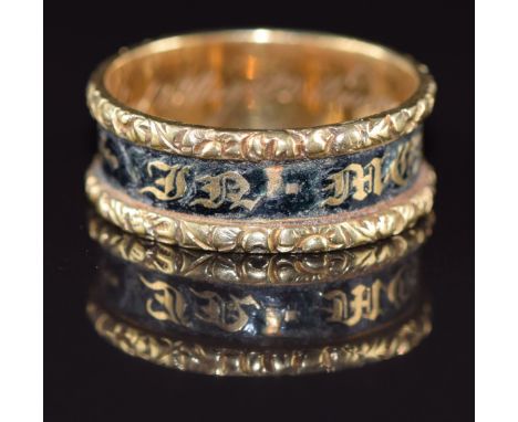 Georgian 18ct gold ring set with black enamel reading 'In memory of' engraved to the inner band 'Edward Gillow born 27th Janu