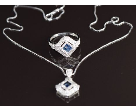 A 9ct white gold ring set with four sapphires surrounded diamonds (size K/L) with matching pendant on 9k white gold chain, 5g