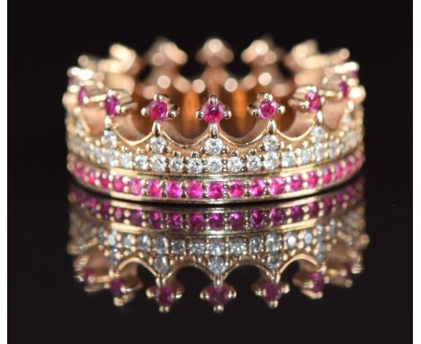 An 18ct gold eternity ring in the form of a crown set with rubies, diamonds and pink sapphires, by Taylor &amp; Hart, with pa