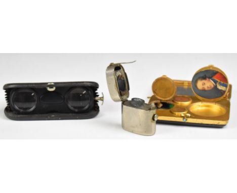 Novelty compact or purse with watch holder to top, opening to reveal holders for both full and half sovereigns, with compact 