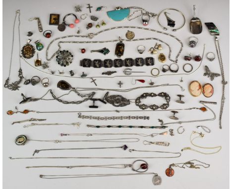 A large collection of silver jewellery including two pairs of cufflinks, eleven pendants set with pressed amber, abalone, mot
