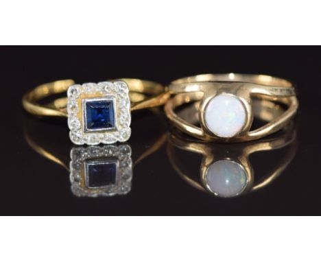 A 9ct gold ring set with an opal (2.1g, size M) and an Art Deco 18ct gold ring set with a sapphire and diamonds (band cut), 1