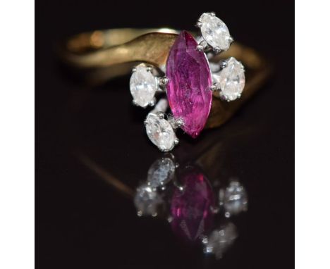 An 18ct gold ring set with a marquise cut ruby of approximately 0.7ct&nbsp;and four marquise cut diamonds, 3g, size O&nbsp;