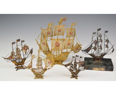 Five filigree (some possibly silver gilt, the example on the base likely silver) Portuguese novelty filigree model galleons o