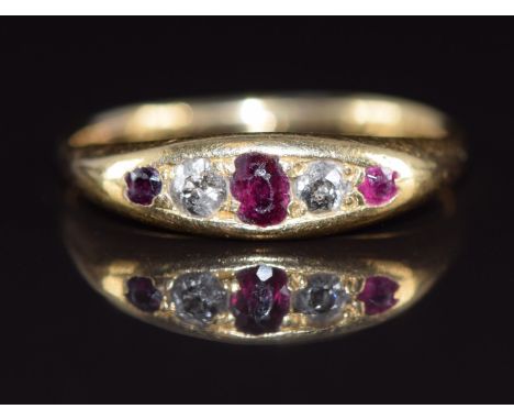 A c1915 18ct gold ring set with rubies and diamonds, 3.3g, size M