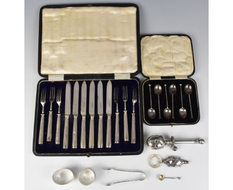 Hallmarked silver items including cased set of seal top spoons, two napkin rings and pair of sugar nips, weight 110g, cased s