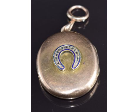 Victorian / Edwardian 9ct rose gold locket set with rose cut diamonds and blue enamel in a horseshoe design, 19g, 3.5 x 3cm