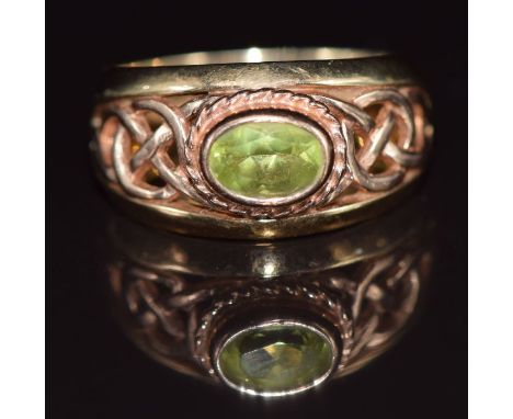 Clogau&nbsp;9ct gold ring set with an oval cut peridot, with pierced Celtic shoulders, 5.3g, size M