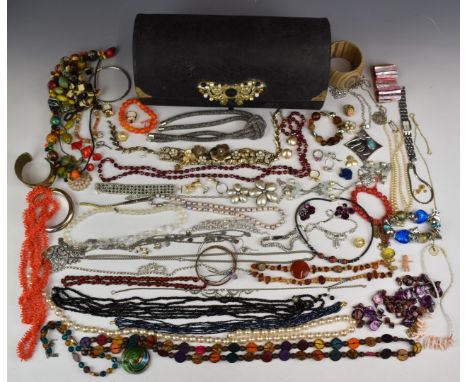 A collection of jewellery including garnet, amber,&nbsp;diamant&eacute;&nbsp;and Monet necklaces, vintage brooches including 