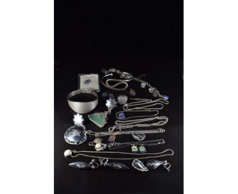 A collection of silver jewellery including 1970's pendant set with aventurine quartz, Art Deco bangle, charm bracelet with en