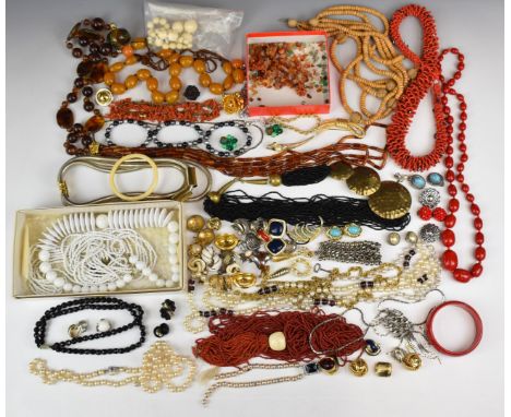 A collection of costume jewellery including vintage earrings, vintage brooches, beads, 1980's necklaces, freshwater pearl nec