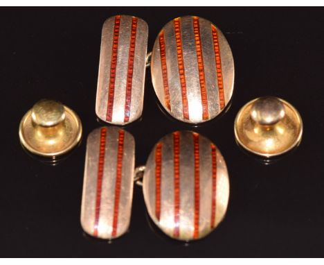 A pair of 9ct gold cufflinks set with red guilloch&eacute; enamel, Birmingham 1911, and two 9ct gold studs, 8g&nbsp;