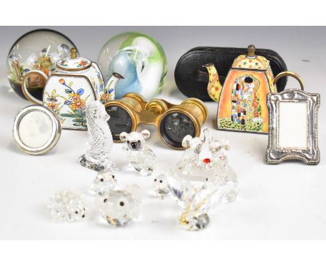 Hallmarked silver miniature photograph frames, enamel teapots, Swarovski and Waterford glass animals, opera glasses, Caithnes