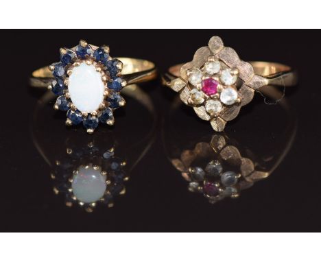 Two 9ct gold rings, one set with an opal surrounded by sapphires and the other synthetic ruby and spinel, 5.2g, size L &amp; 