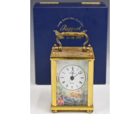 Rapport London gilt metal cased carriage clock with porcelain side panels and dial, decorated with continental style scenes, 