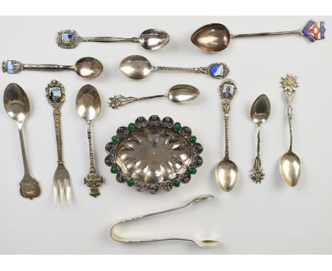 Hallmarked silver and continental silver collector's spoons and a pair of sugar tongs, some with enamel decoration, and a sma