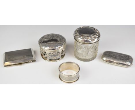 Hallmarked silver items comprising two early 20thC cigarette cases, one Birmingham 1902 the other Birmingham 1927, length of 