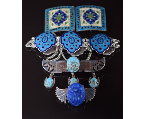 Enamel bracelet marked Jaisaram Mooltan, enamel belt buckle, and two Egyptian Revival brooches&nbsp;