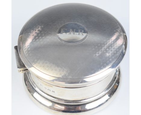 George V hallmarked silver dressing table or jewellery pot with engine turned Art Deco style lid, opening to reveal mirror to