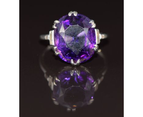 Art Deco&nbsp;18ct white gold ring set with an oval cut amethyst of approximately 9ct and baguette cut diamonds to the should