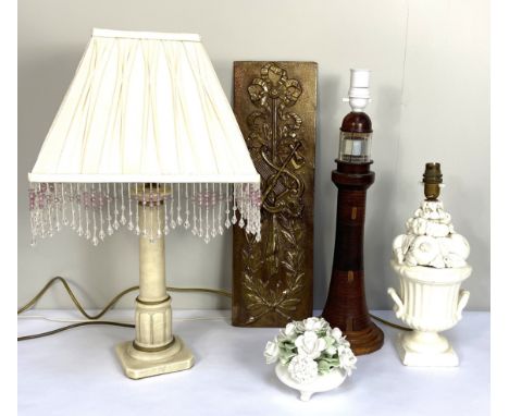 A vintage table lamp in the form of the Eddystone lighthouse, with carved and swept out base; also a column table lamp; a cam