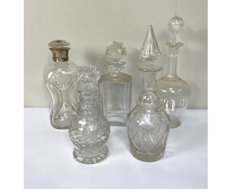 Five assorted decanters, including a silver collared &lsquo;Dimple&rsquo; decanter, and four others (5)