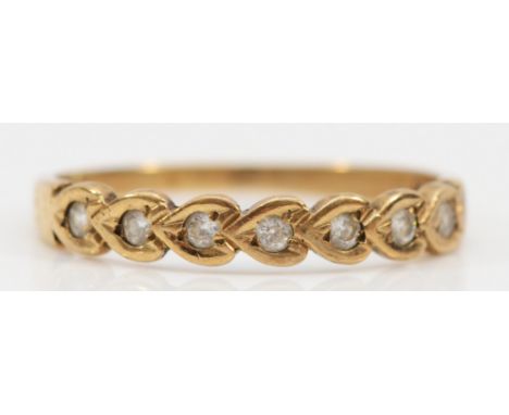 A 9ct gold cubic zirconia half eternity ring, Q, 1.4g