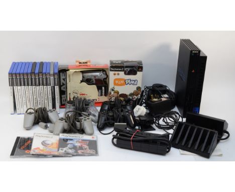 A Playstation 2 (PS2) console with original instruction manual, together with five controllers, a Scorpion light gun, boxed, 