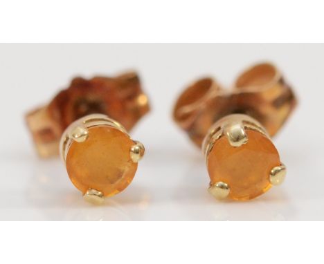 A pair of 9ct gold citrine earrings with scroll backs, 3mm diameter, 0.3g