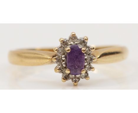 A 9ct gold amethyst and diamond cluster ring, O 1/2, 2g