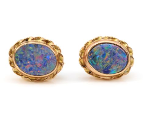 A pair of 9ct gold opal doublet earrings with scroll backs, 1.6g