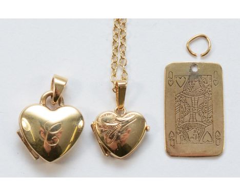 A 9ct gold pendant in the shape of a Queen playing card, together with two heart shaped lockets, 6.6g