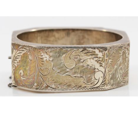 A 925 silver and engraved bracelet, 62 x 55mm, 25mm wide, 48gm