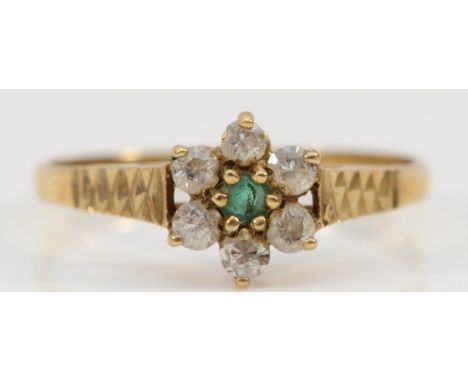 A 9ct gold emerald and cubic zirconia floral cluster ring, O, 1.2g