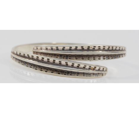 David Anderson, a Norwegian silver crossover bangle, 36gm