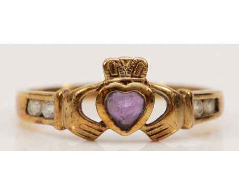 A 9ct gold amethyst and cubic zirconia Claddagh ring, O 1/2, 1.9g