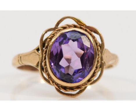 A 9ct gold and amethyst single stone ring, P, 3gm