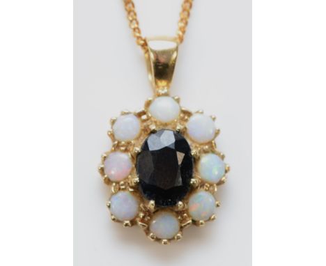 A 9ct gold opal and sapphire cluster pendant with a chain, 13mm x 11mm cluster, 2.6g