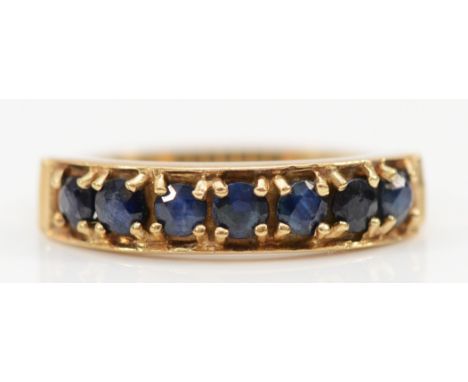 A 9ct gold sapphire half eternity ring, O, 2.2g