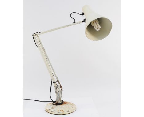 An Anglepoise desk lamp, with spring mechanism and electric plug, c.1973-85, 86cm at full height.