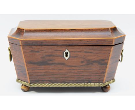 A nineteenth century mahogany sarcophagus tea caddy, inlaid with boxwood accents, bone escutcheon, internal lids, key, 15cm x