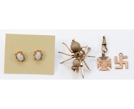 Two 9ct rose gold pendants, symbol of auspiciousness and good luck, Birmingham 1910 and Chester 1902, 1.4g, together with a p