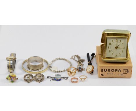 Two 9ct gold rings, 5.7gm, a 9ct gold ladies wristwatch, other jewellery and an alarm clock