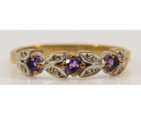 A 9ct gold diamond and amethyst floral ring, N, 1.7g